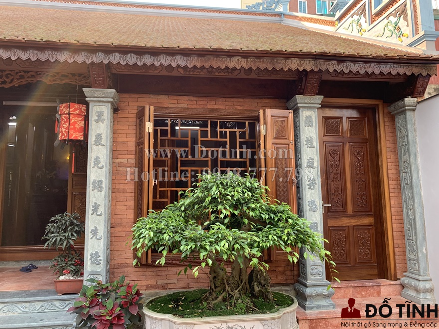Đây là ngôi nhà của gia đình anh Tuấn được sử dụng hoàn toàn gạch đỏ và gỗ cao cấp theo mái ngói truyền thống (Ảnh: Dotinh.com)